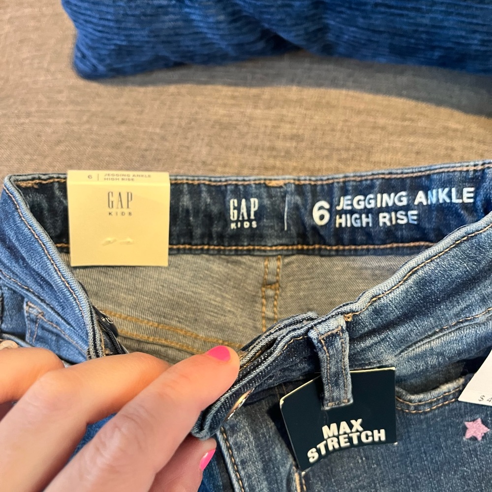 Tags still on jeans for girls. Size 6